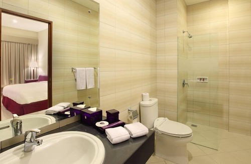 Raya Kuta Apartment | R 1019 Aman studio with WIFI, Daily Shuttle & GYM - Breakfast Inc