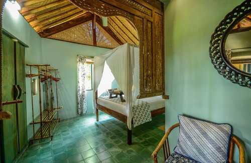 Jasri Resort | Romantic Private Villa facing the pool.Soft aqua handmade tiles and antiques.