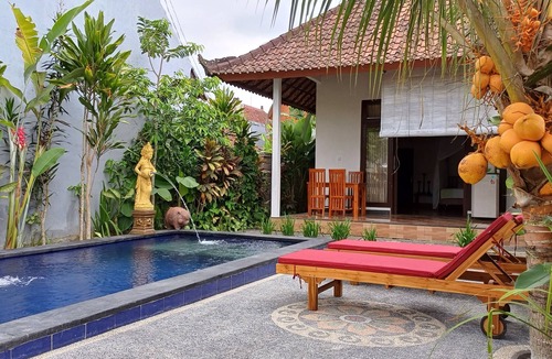 Pejeng Kawan Villa | Step into a world of tranquility at our two-bedroom villa with private pool