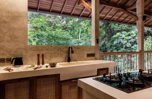 Petulu Villa | Your Exclusive Escape into Nature with Stunning Art Luxury and Riverfront Views